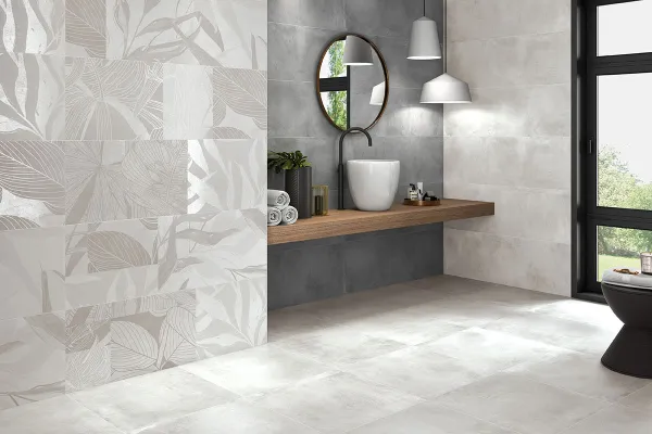 Baño con azulejos efecto cemento en tonos neutros, colección Madox de Halcón