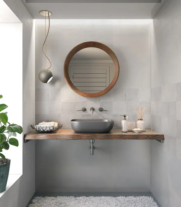 Baño con azulejos efecto cemento en tonos neutros, colección Madox de Halcón