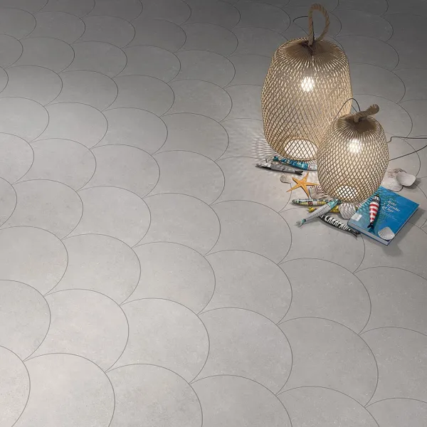 Baño con azulejos efecto cemento en tonos neutros, colección Nassau de Vives