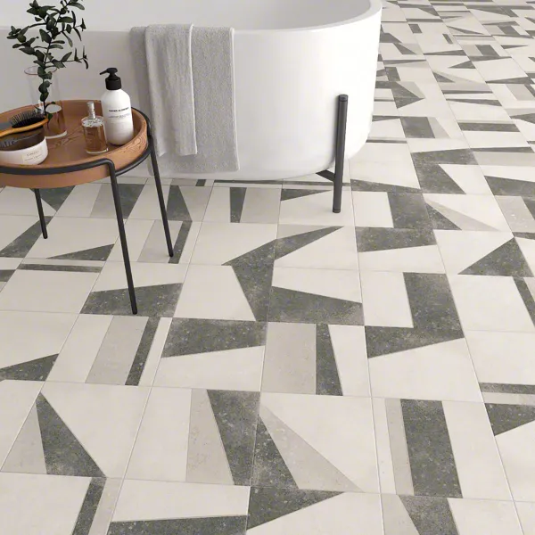 Baño con azulejos efecto cemento en tonos neutros, colección Nassau de Vives