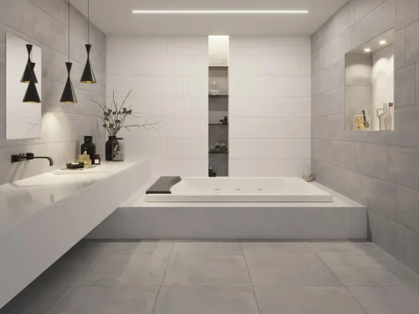 Baño con azulejos efecto cemento en tonos neutros, colección Neo de Ibero Casa Infinita