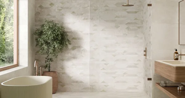 Baño con azulejos efecto cemento en tonos cálidos, colección Noho de Aparici