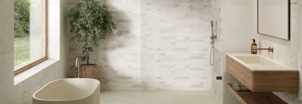 Baño con azulejos efecto cemento, colección Noho de Aparici