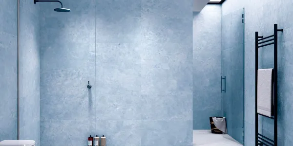 Baño con azulejos efecto cemento en tonos fríos, colección North de Apavisa