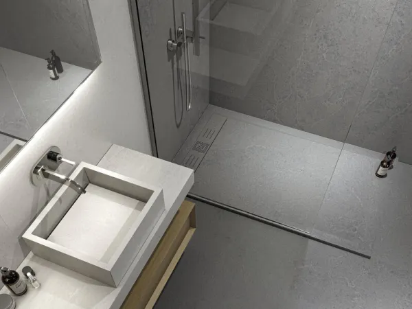 Baño con azulejos efecto cemento en tonos neutros, colección Norwich de Cifre