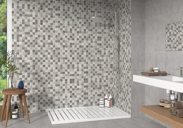 Baño con azulejos efecto cemento en tonos neutros, colección Norwich de Ecoceramic