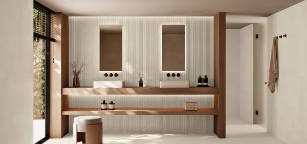 Baño con azulejos efecto cemento en tonos cálidos, colección Omni de Peronda