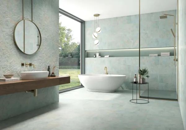 Baño con azulejos efecto cemento en tonos fríos, colección Panamera de Colorker