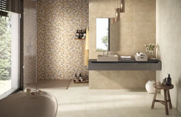 Baño con azulejos efecto cemento en tonos cálidos, colección Pictura de Naxos