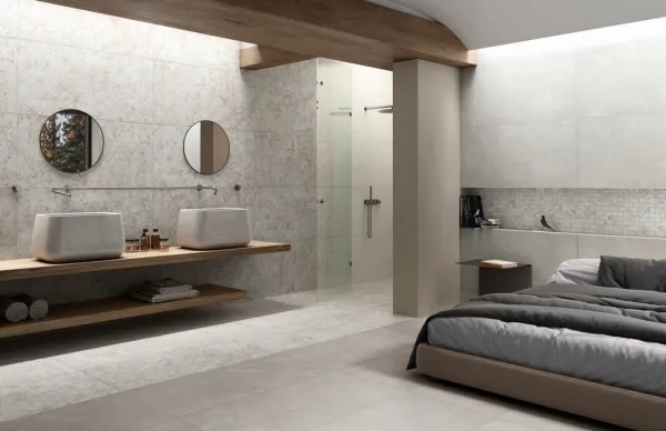 Baño con azulejos efecto cemento en tonos neutros, colección Pictura de Naxos