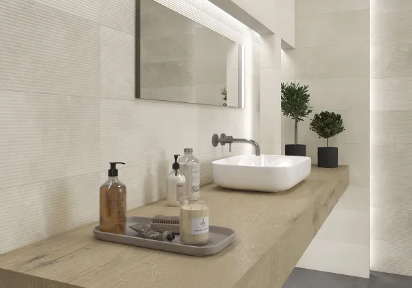 Baño con azulejos efecto cemento, colección Powder - dust de Argenta