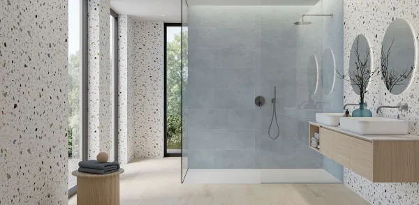 Baño con azulejos efecto cemento, colección Q tex de Durstone