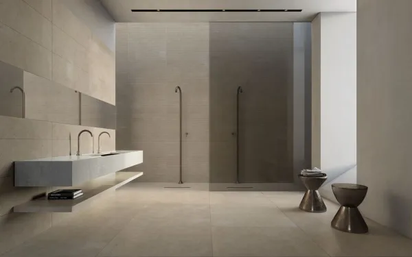 Baño con azulejos efecto cemento, colección Scala de Peronda