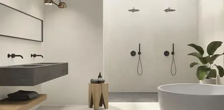 Baño con azulejos efecto cemento en tonos neutros, colección Seven de ITT
