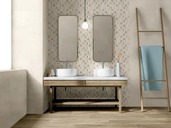 Baño con azulejos efecto cemento en tonos cálidos, colección Seven de ITT