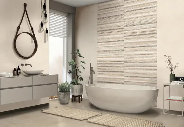 Baño con azulejos efecto cemento en tonos cálidos, colección Seven de ITT