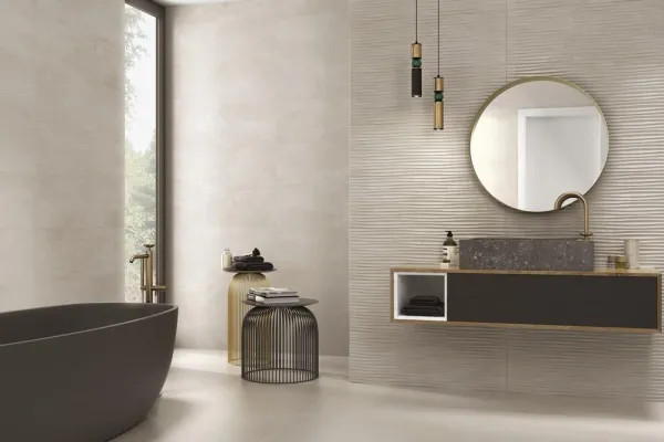 Baño con azulejos efecto cemento, colección Slab de Emigres