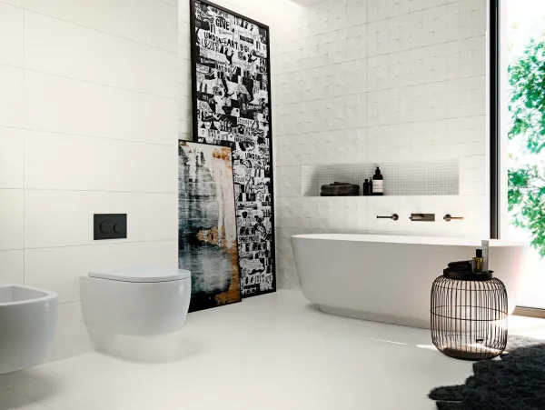 Baño con azulejos efecto cemento en tonos neutros, colección Studio de Aparici