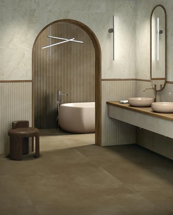 Baño con azulejos efecto cemento en tonos cálidos, colección Tandem de Vives