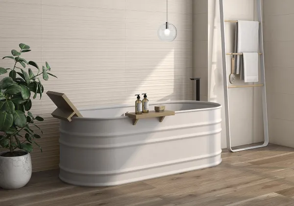 Baño con azulejos efecto cemento en tonos cálidos, colección Tanum - musson de Argenta