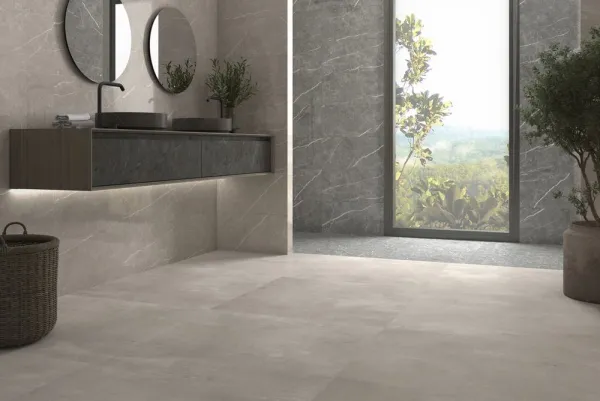 Baño con azulejos efecto cemento en tonos neutros, colección Teba de TAU ceràmica