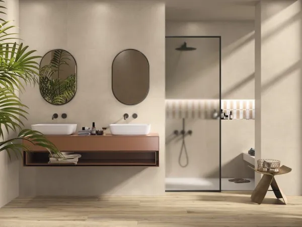 Baño con azulejos efecto cemento en tonos cálidos, colección Verse de Ape