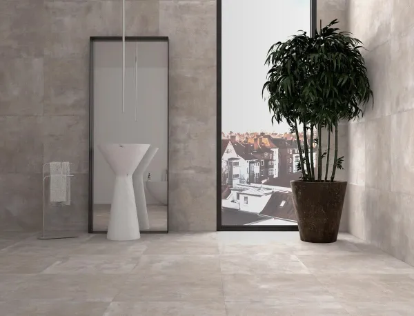 Baño con azulejos efecto cemento en tonos neutros, colección Walmer de TAU ceràmica