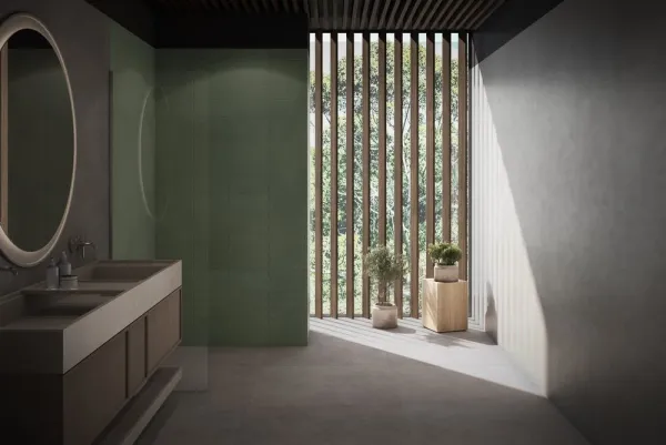 Baño con azulejos efecto cemento en tonos neutros, colección Watery de TAU ceràmica