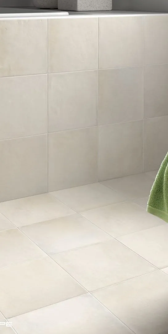 Baño con azulejos efecto hidráulico, colección Ares de Equipe