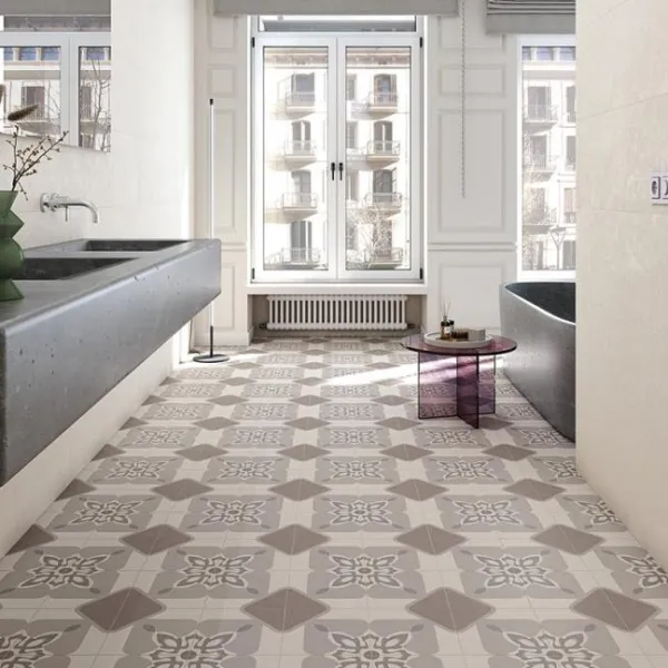 Baño con azulejos efecto hidráulico en tonos neutros, colección Bali de Vives