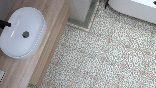 Baño con azulejos efecto hidráulico en tonos fríos, colección Bel histoire de Revoir Paris