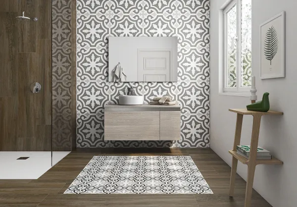 Baño con azulejos efecto hidráulico en tonos neutros, colección Havana de Roca