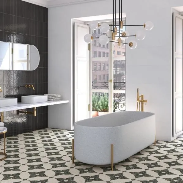 Baño con azulejos efecto hidráulico en tonos neutros, colección Niza de Vives