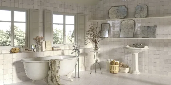 Baño con azulejos efecto hidráulico en tonos neutros, colección Souk de Ape
