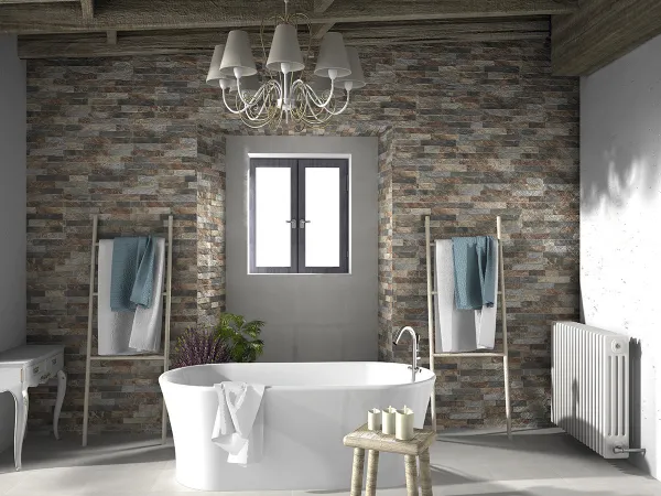 Baño con azulejos efecto ladrillo, colección Ribera de Realonda
