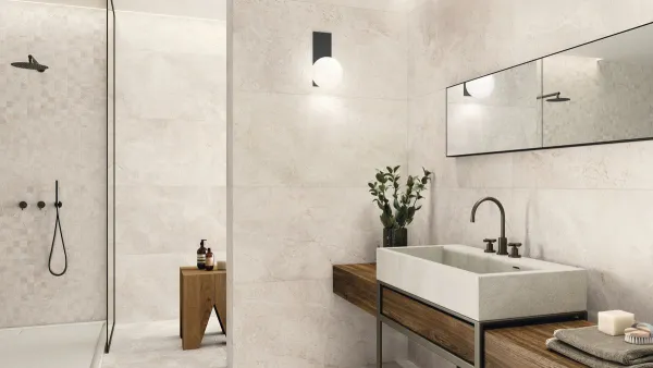Baño con azulejos efecto mármol, colección Augustus de Ape