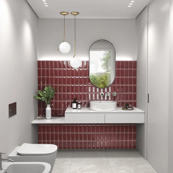 Baño con azulejos efecto mármol en tonos cálidos, colección Frame de Aleluia