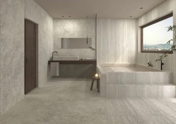 Baño con azulejos efecto mármol, colección Linen de Museum