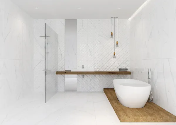 Baño con azulejos efecto mármol en tonos neutros, colección Marbleous de Metropol