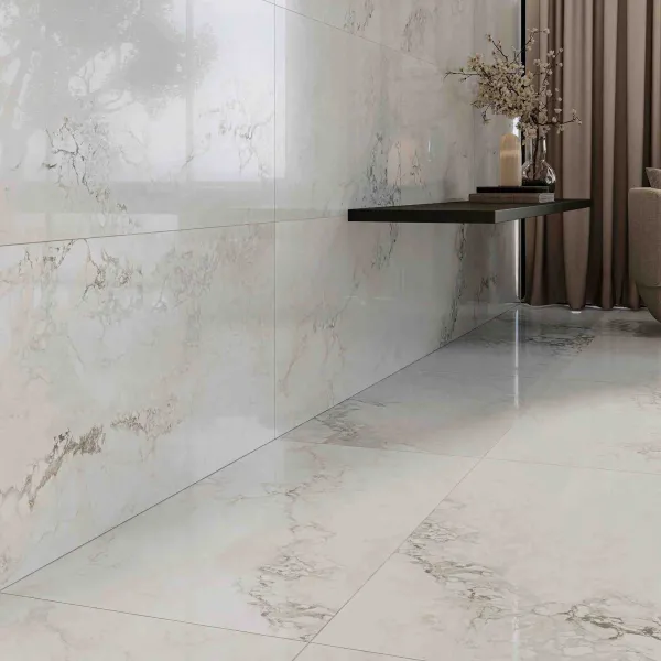 Baño con azulejos efecto mármol en tonos neutros, colección Vermont de Durstone