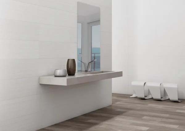 Baño con azulejos efecto monocolor en tonos neutros, colección Bianchi de TAU ceràmica