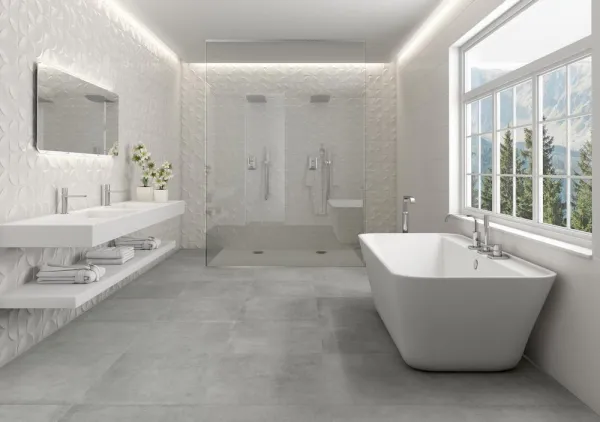 Baño con azulejos efecto monocolor en tonos neutros, colección Bianchi de TAU ceràmica