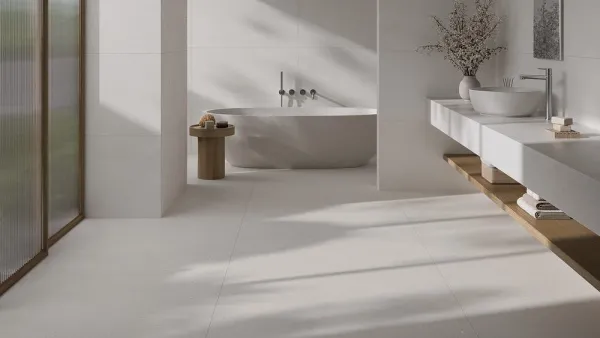 Baño con azulejos efecto monocolor en tonos neutros, colección Calm de Fanal