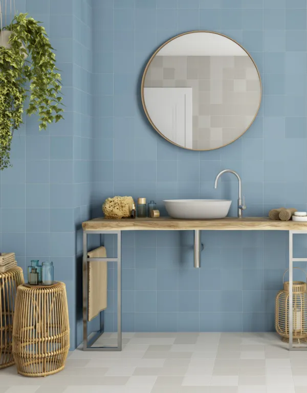 Baño con azulejos efecto monocolor en tonos fríos, colección Chicago de Dune
