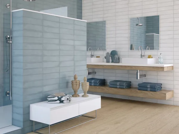Baño con azulejos efecto monocolor en tonos fríos, colección Colonial de Cifre