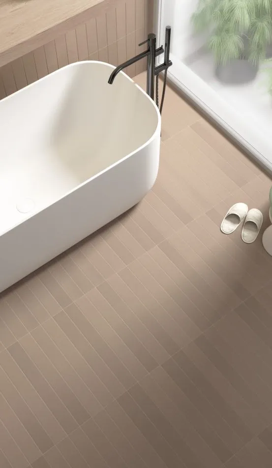 Baño con azulejos efecto monocolor en tonos cálidos, colección Earth de Equipe