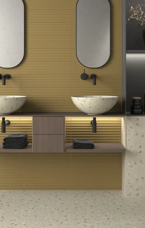 Baño con azulejos efecto monocolor en tonos cálidos, colección Fragmenta & ima de Dune