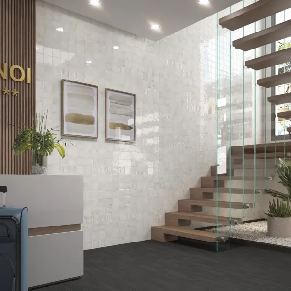 Baño con azulejos efecto monocolor en tonos neutros, colección Hanoi de Equipe