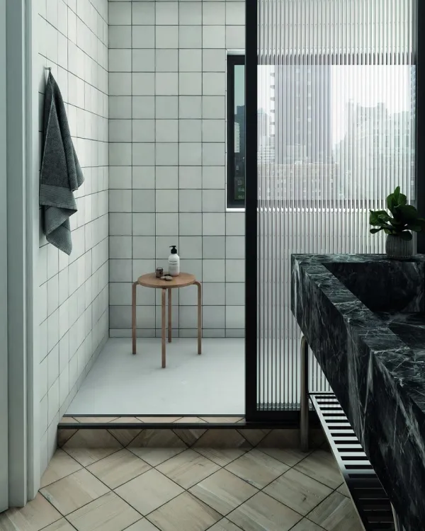 Baño con azulejos efecto monocolor, colección Magma de Equipe
