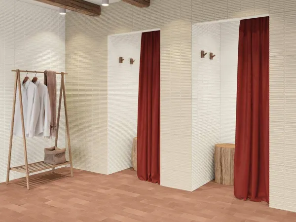 Baño con azulejos efecto monocolor en tonos cálidos, colección Moves de Harmony